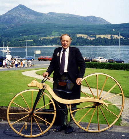 Chief George MacMillan of MacMillan & Knap with velocipede